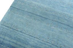 Backside of handmade New Persian Gabbeh rug showing knot structure and weave density