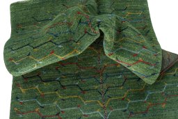 Corner detail of New Persian Gabbeh rug showing border pattern and Wool pile