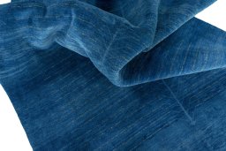 Corner detail of New Persian Gabbeh rug showing border pattern and Wool pile