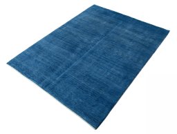 Corner detail of New Persian Gabbeh rug showing border pattern and Wool pile