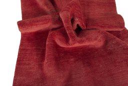 Corner detail of New Persian Gabbeh rug showing border pattern and Wool pile