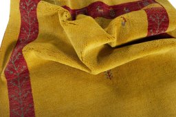Corner detail of New Persian Gabbeh rug showing border pattern and Wool pile