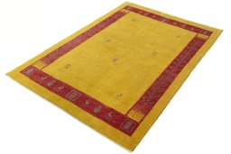 Corner detail of New Persian Gabbeh rug showing border pattern and Wool pile