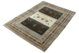 Corner detail of New Persian Gabbeh rug showing border pattern and Wool pile