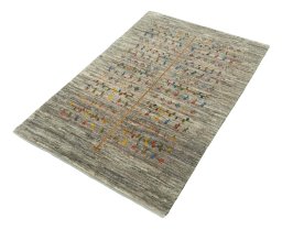 Corner detail of New Persian Gabbeh rug showing border pattern and Wool pile