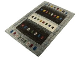 Corner detail of New Persian Gabbeh rug showing border pattern and Wool pile