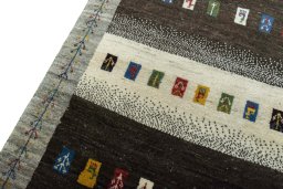 Backside of handmade New Persian Gabbeh rug showing knot structure and weave density