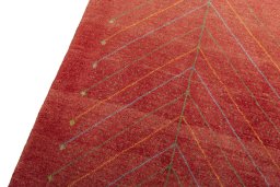 Backside of handmade New Persian Gabbeh rug showing knot structure and weave density