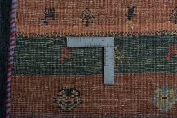 Close-up detail of New Persian Gabbeh rug from Iran / Persia showing Wool weave