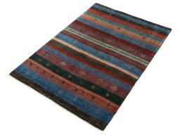 Corner detail of New Persian Gabbeh rug showing border pattern and Wool pile