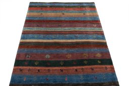 Surface texture of New Persian Gabbeh rug with natural Wool and intricate pattern