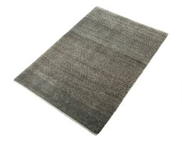 Corner detail of New Persian Gabbeh rug showing border pattern and Wool pile