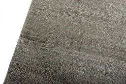 Backside of handmade New Persian Gabbeh rug showing knot structure and weave density