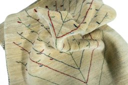 Corner detail of New Persian Gabbeh rug showing border pattern and Wool pile
