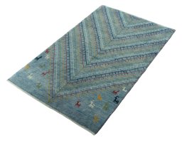 Corner detail of New Persian Gabbeh rug showing border pattern and Wool pile