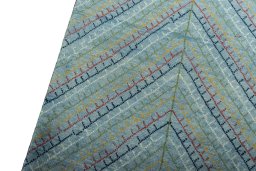 Backside of handmade New Persian Gabbeh rug showing knot structure and weave density