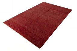 Corner detail of New Persian Gabbeh rug showing border pattern and Wool pile