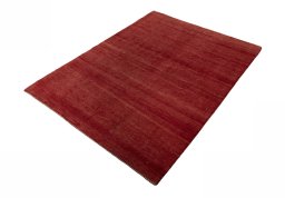 Corner detail of New Persian Gabbeh rug showing border pattern and Wool pile