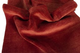 Corner detail of New Persian Gabbeh rug showing border pattern and Wool pile
