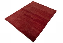 Corner detail of New Persian Gabbeh rug showing border pattern and Wool pile