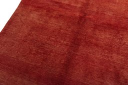 Backside of handmade New Persian Gabbeh rug showing knot structure and weave density