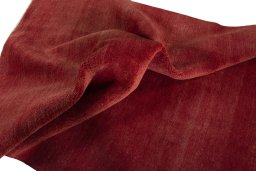 Corner detail of New Persian Gabbeh rug showing border pattern and Wool pile