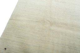 Backside of handmade New Persian Gabbeh rug showing knot structure and weave density