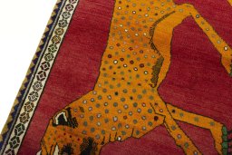 Backside of handmade 2000s Persian Gabbeh rug showing knot structure and weave density