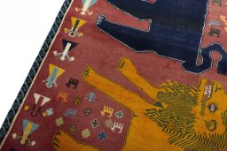 Backside of handmade 2000s Persian Gabbeh rug showing knot structure and weave density