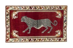 Full view of 2000s Persian Gabbeh rug from Iran / Persia, 225 × 137 cm in Red tones