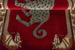 Full view of 2000s Persian Gabbeh rug from Iran / Persia, 225 × 137 cm in Red tones