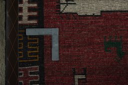 Close-up detail of 2000s Persian Gabbeh rug from Iran / Persia showing Wool weave