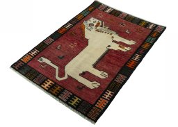 Corner detail of 2000s Persian Gabbeh rug showing border pattern and Wool pile