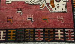 Central medallion detail of 2000s Persian Gabbeh rug from Iran / Persia