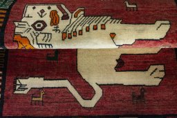 Full view of 2000s Persian Gabbeh rug from Iran / Persia, 153 × 107 cm in Red tones