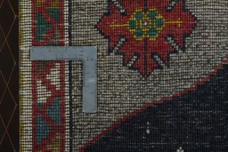 Close-up detail of 2000s Persian Gabbeh rug from Iran / Persia showing Wool weave