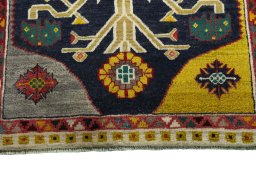 Central medallion detail of 2000s Persian Gabbeh rug from Iran / Persia