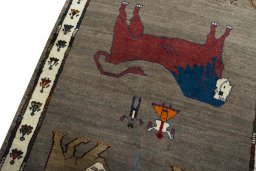 Backside of handmade New Persian Gabbeh rug showing knot structure and weave density