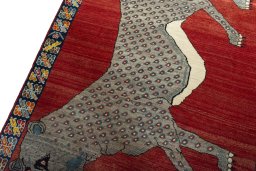 Backside of handmade 2000s Persian Gabbeh rug showing knot structure and weave density