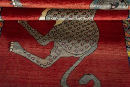 Full view of 2000s Persian Gabbeh rug from Iran / Persia, 208 × 133 cm in Red tones