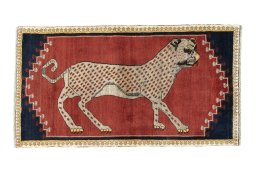 Full view of 2000s Persian Gabbeh rug from Iran / Persia, 190 × 105 cm in Red tones