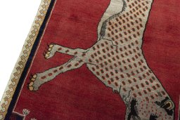 Backside of handmade 2000s Persian Gabbeh rug showing knot structure and weave density