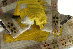 Corner detail of 2000s Persian Gabbeh rug showing border pattern and Wool pile