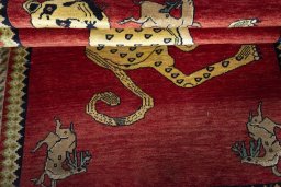 Full view of 2000s Persian Gabbeh rug from Iran / Persia, 205 × 140 cm in Red tones