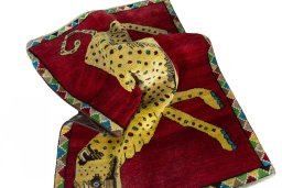Corner detail of 2000s Persian Gabbeh rug showing border pattern and Wool pile