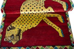 Full view of 2000s Persian Gabbeh rug from Iran / Persia, 153 × 100 cm in Red tones
