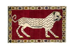 Full view of 2000s Persian Gabbeh rug from Iran / Persia, 165 × 105 cm in Red tones