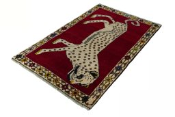 Corner detail of 2000s Persian Gabbeh rug showing border pattern and Wool pile