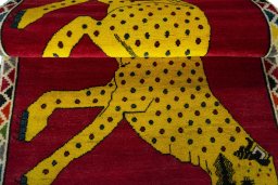 Full view of 2000s Persian Gabbeh rug from Iran / Persia, 160 × 105 cm in Red tones