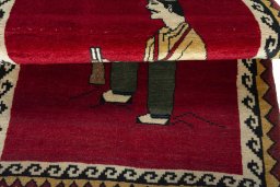 Full view of 2000s Persian Gabbeh rug from Iran / Persia, 134 × 90 cm in Red tones